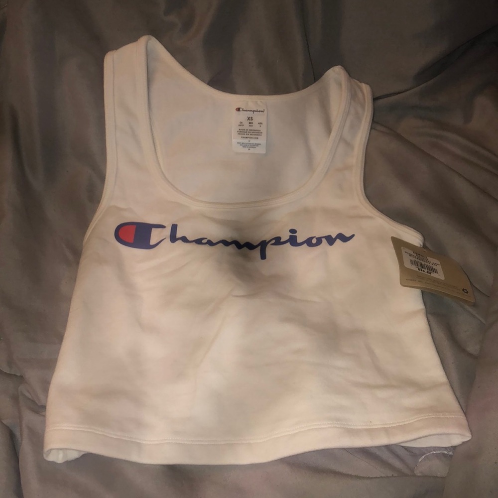 Size XS woman’s champions tank top brand new with tags.